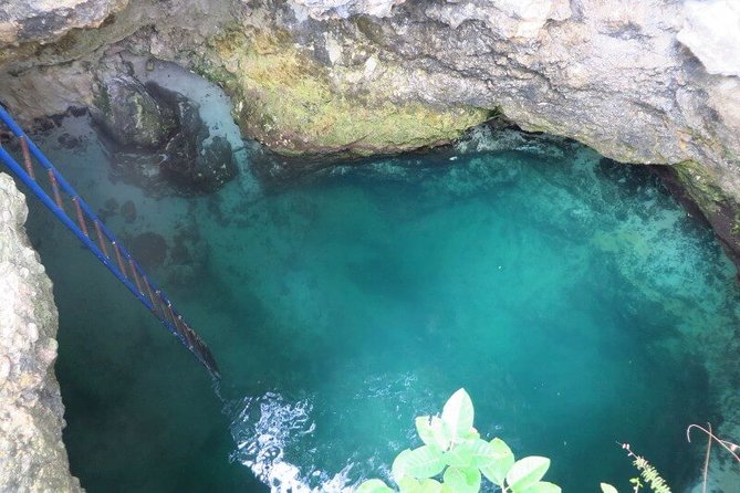 4. Negril Full-Day Guided / Sunset Tours 7miles Beach Blue Hole & Ricks Café - Swimming 35 feet below ground at Blue Hole