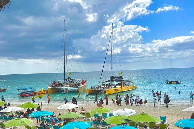 7 Mile Beach Party Catamaran Cruise with Snorkeling & Ricks Cafe - Key points before you book