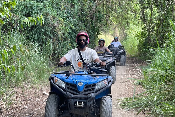ATV and Bamboo Rafting with Transport from Montego Bay - Floating Downstream on a Bamboo Raft