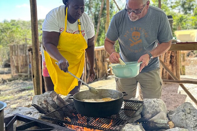 Authentic Jamaican Cooking Experience in the Mountain from mobay - Cooking Jamaican food over an outdoor wood fire