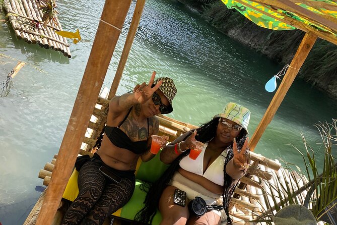 Bamboo Rafting Montego Bay - Boarding the bamboo raft with your captain