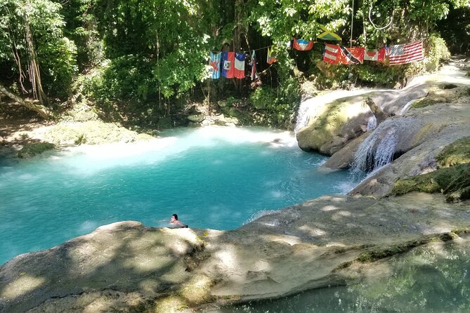 Blue Hole Day Trip with Admission and Guided Tour from Montego Bay - Entering Blue Hole with a local guide