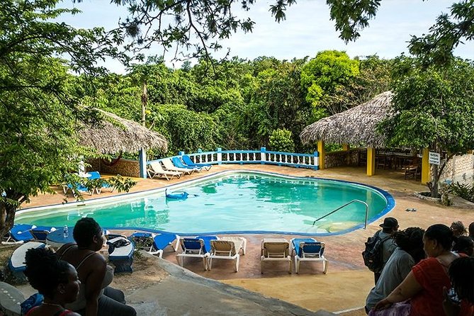 Blue Hole Mineral Spring and Rick's Cafe - A local-style stop, not a quiet natural pool