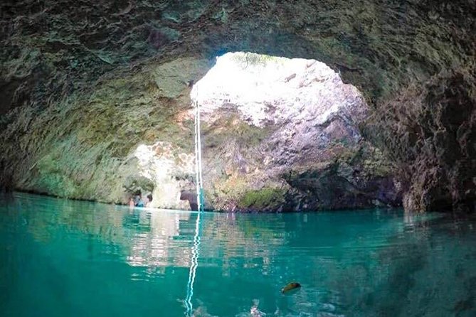 Blue Hole Mineral Spring, Ricks Cafe, 7 Mile Beach and Shopping Private Tour - Two hours on Seven Mile Beach