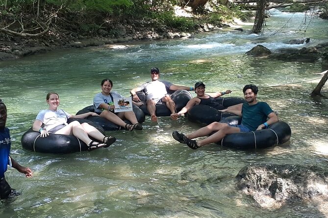 Blue Hole Secret Falls and River Tubing Private Tour - White River tubing through the rainforest
