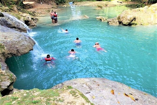 Blue Hole & Secret Falls Day-Trip with Shopping from Grand Palladium - Meeting the local waterfall team