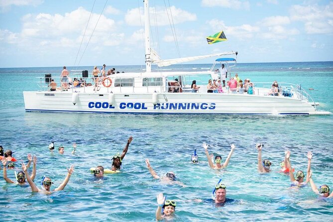 Catamaran Party Cruise and Snorkeling from Montego Bay - A catamaran ride with music, snacks, and open drinks