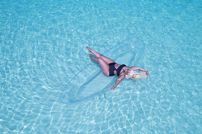 Clear Kayak Drone Video & Photoshoot in Montego Bay - Getting into the clear kayak