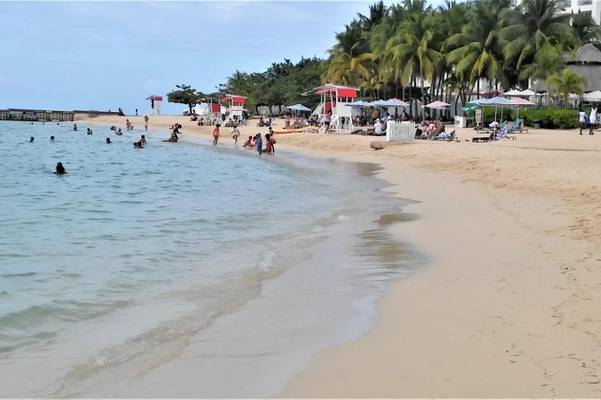Doctor's Cave Beach, Margaritaville & Shopping from Montego Bay Hotels - A calm beach with a few practical limits