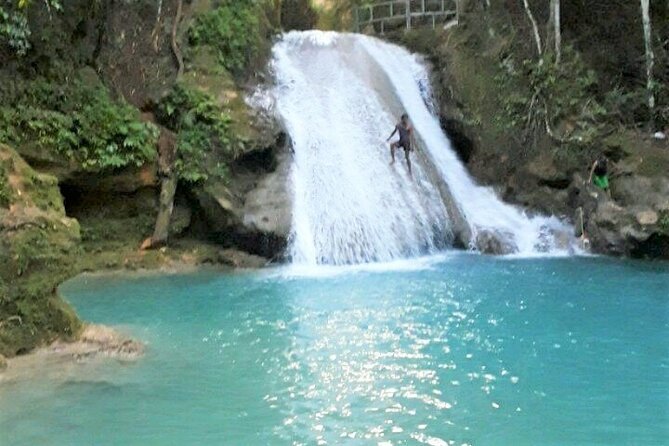 Dunn's Falls and Blue Hole Daytrip with Lunch from Montego Bay & Trelawny - Climbing Dunn’s River Falls, one step at a time