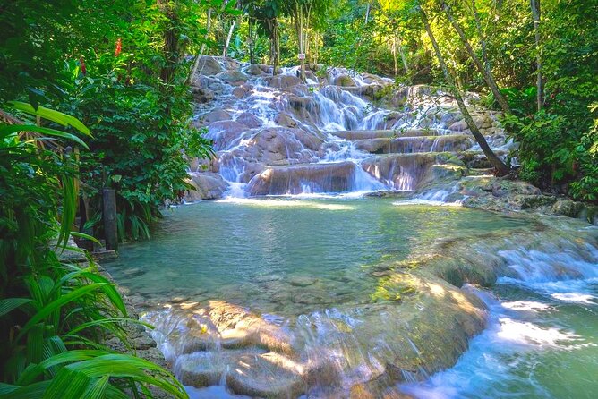 Dunn's River Falls , Bamboo Rafting & ATV Ride from Montego Bay - Climbing Dunn’s River Falls, one wet step at a time