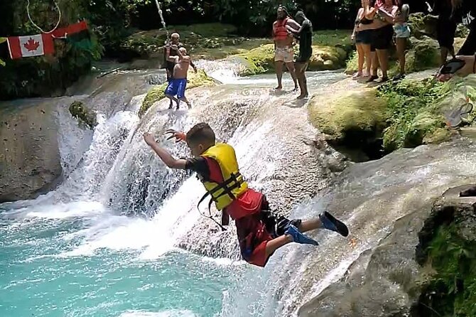 Dunns River Falls & Blue Hole Combo from Montego Bay with Pick Up - A Jamaican jerk stop breaks up the activity