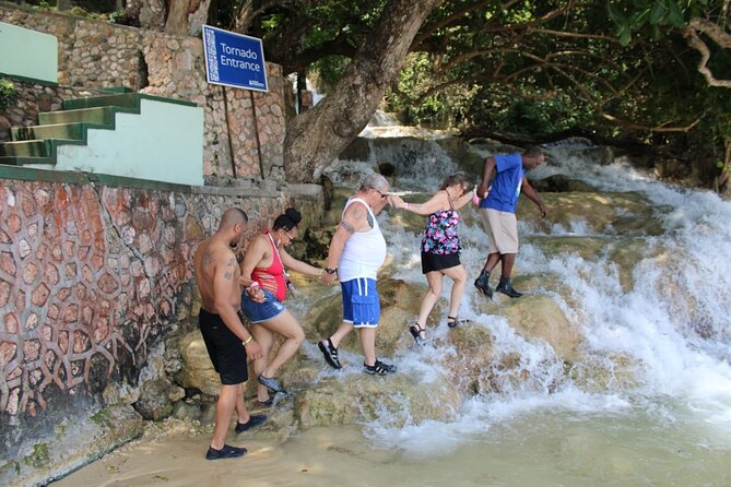 Dunns River Falls Half Day Private Tour Including Entry Fee. - The people behind the wheel
