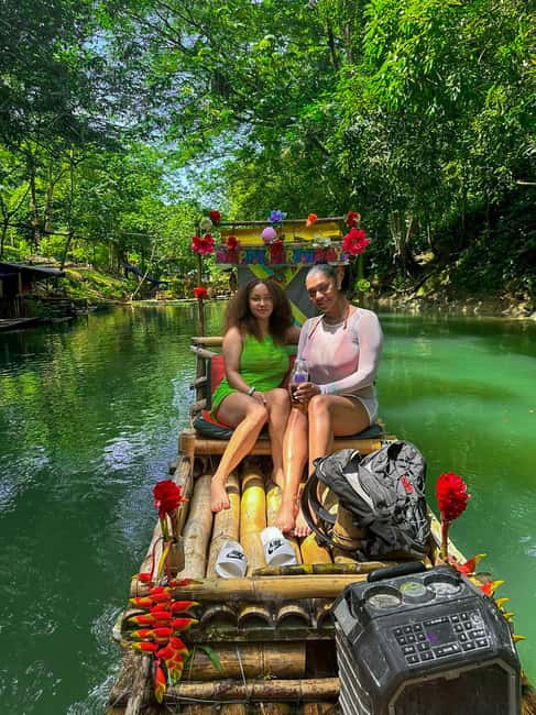 From Montego Bay: Bamboo Rafting & Limestone Massage Tour - Boarding a 30-foot bamboo raft