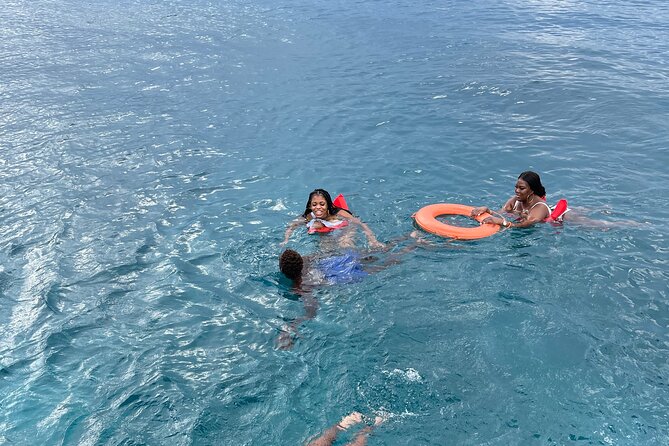 Half Day Catamaran Party Boat, Snorkeling and Hip Strip Tour - Boarding the Dreamer Catamaran