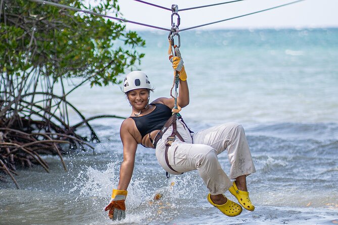 Jamaica All-Access Adventure Pass at Ocean Outpost - Ziplining over the water