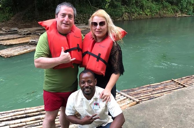 Jamaica Bamboo Rafting Tour Limestone Foot Massage - Floating through the Martha Brae rainforest