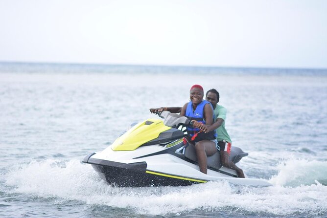 Jet Ski & River Rafting with Limestone Foot Massage from Montego Bay - From Montego Bay hotel pickup to the Caribbean Sea