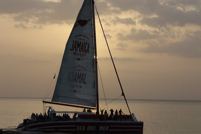 Montego Bay Catamaran: Snorkel Tour with Open Bar & Reggae DJ - Reggae, Soca, and a Jamaican dance lesson