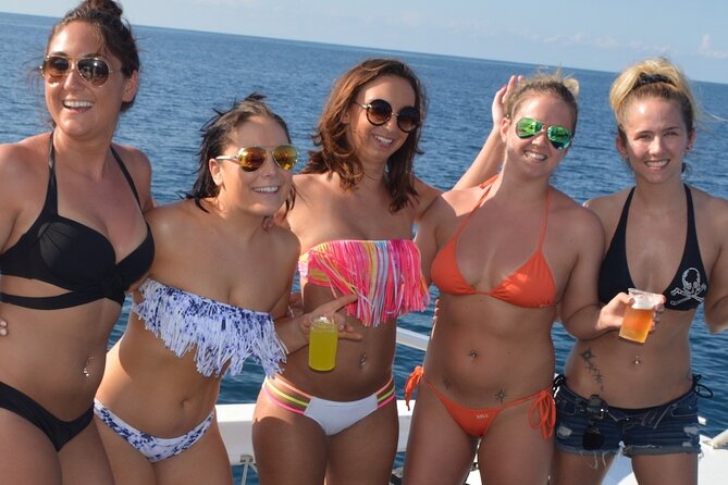 Montego Bay Catamaran: Snorkel Tour with Open Bar & Reggae DJ - The foot massage and other small extras