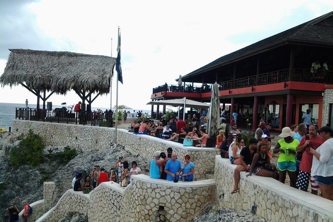 Montego Bay Excursion Negril 7 Miles Beach, Rick's Cafe and Time Square Shopping - Margaritaville for lunch and family entertainment