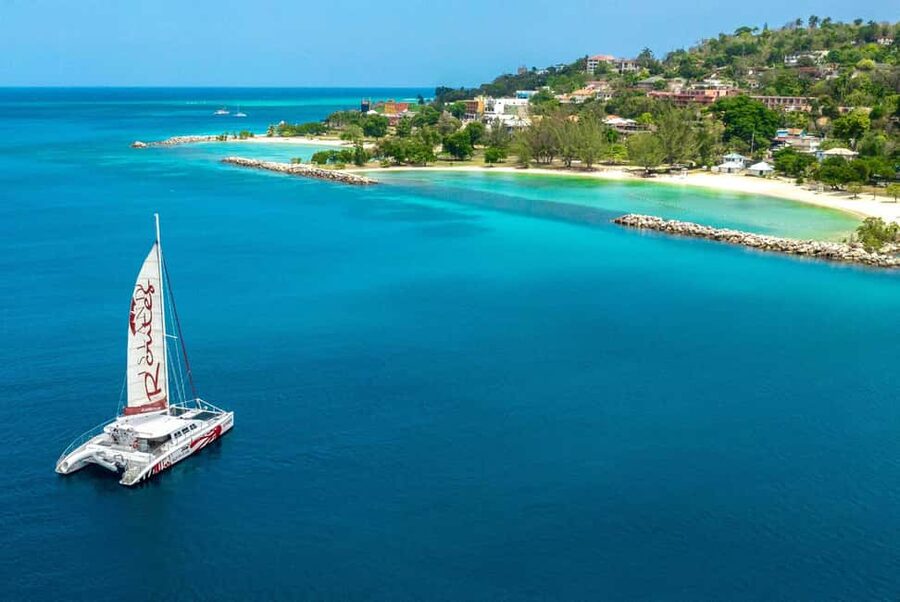 Montego Bay: Reggae Catamaran 18+ Cruise with Open Bar - Montego Bay’s coast from a catamaran