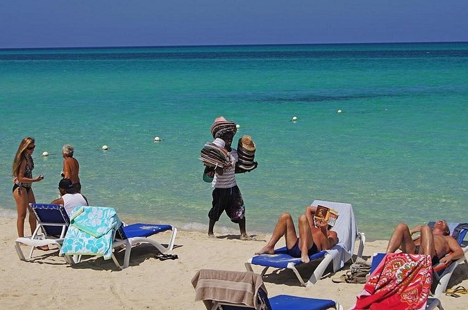 Negril 7 Mile Beach & Rick's Café Combo Tour from Montego Bay - Food, massages, and activities at the beach