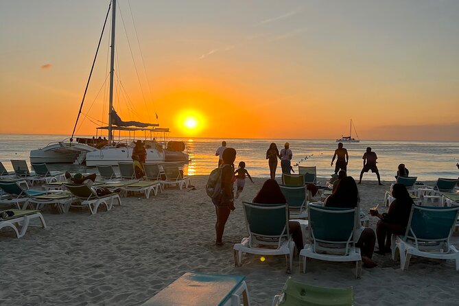 Negril Private Day Tour: ATV Ride, Party Catamaran & Ricks Cafe - Rick’s Cafe and the sunset finish