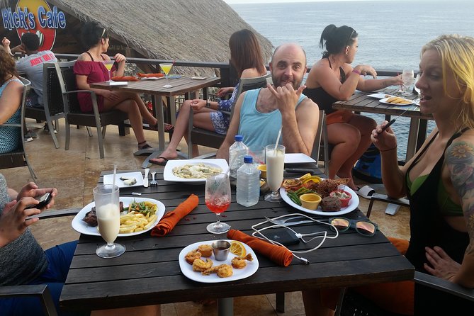 Negril Seven Miles Beach Day and Rick's Cafe Sunset Private Tour - Rick’s Cafe, cliff jumpers, and the sunset hour