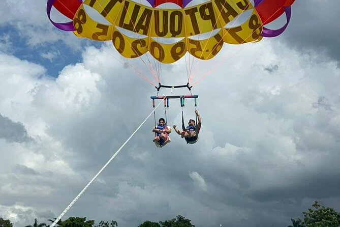 Negrils Seven Miles Beach, Rick's cafe and Parasailing Tour. - Rick’s Cafe adds cliff jumping and a famous Negril stop