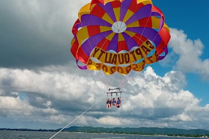 Negrils Seven Miles Beach, Rick's cafe and Parasailing Tour. - Three hours on Negril’s Seven Mile Beach