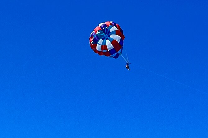 Parasailing above Turquoise Ocean Waters in Montego Bay - The parasail flight, about 30 minutes