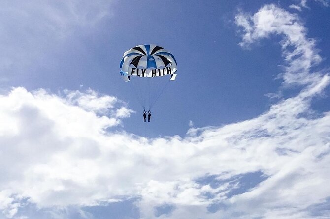 Parasailing, Blue Hole Mineral Spring, Seven Mile Beach - Seven Mile Beach for swimming and free time