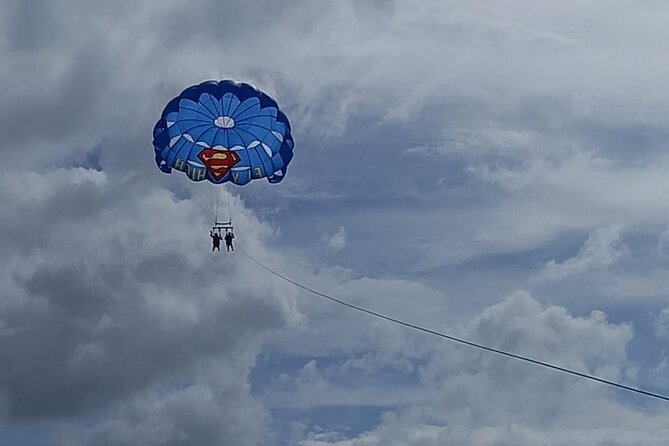 Parasailing, Blue Hole Mineral Spring, Seven Mile Beach - Parasailing above Negril’s coast