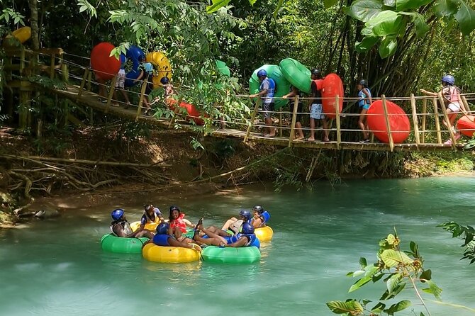 River Rapids Waterfalls Tubing and Beach Adventure with Transport - The Rio Bueno begins with a short jungle walk