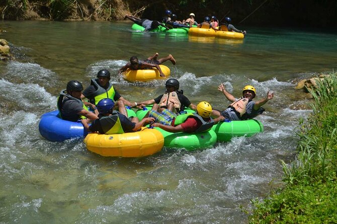 River Rapids Waterfalls Tubing and Beach Adventure with Transport - Bamboo shade, a rope swing, and time to slow down