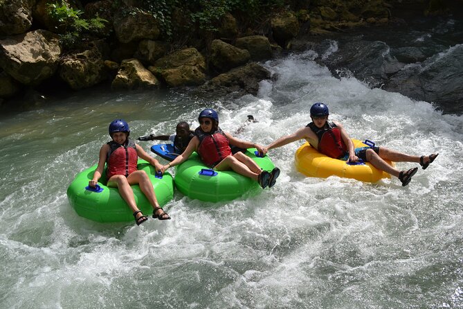 River Rapids Waterfalls Tubing and Beach Adventure with Transport - The final rapids lead to a raft and Bengal Beach